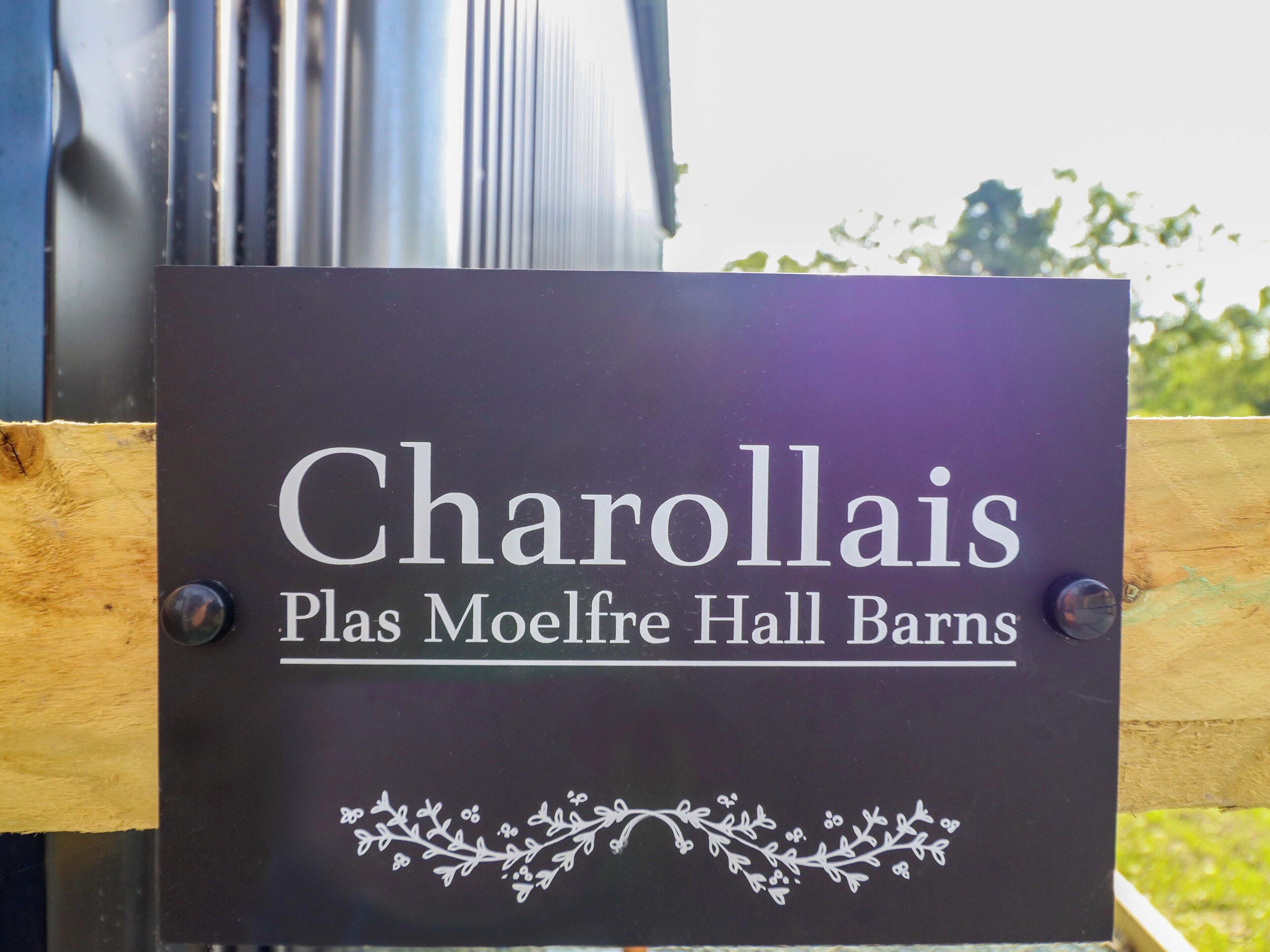 A sign for Charollais Plas Moelfre Hall Barns.