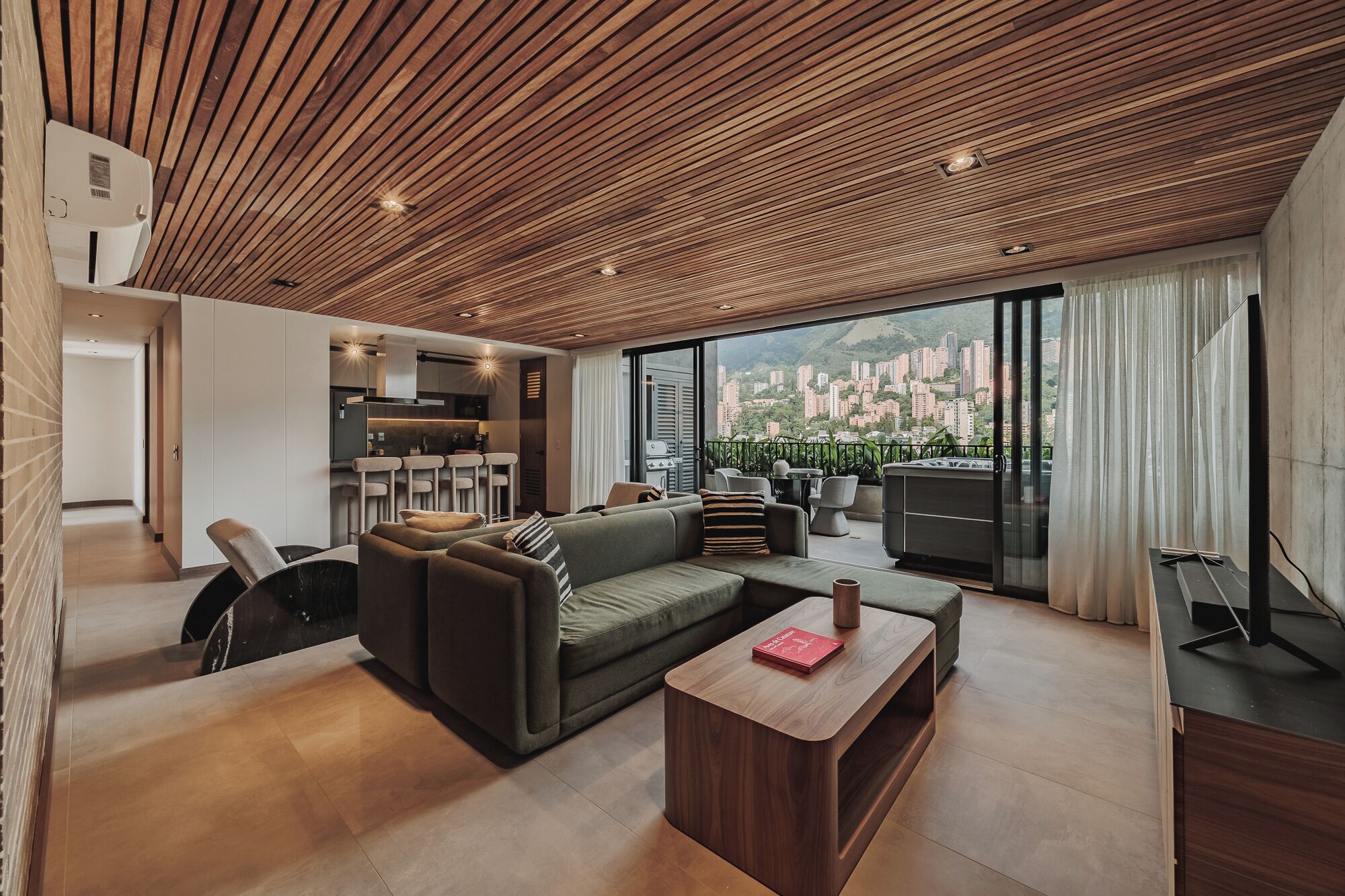 Premium Apartment, City View | Living area | 50-inch Smart TV with digital channels