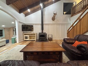 Smart TV, fireplace, foosball, books