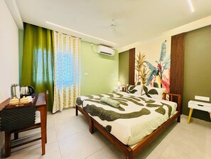 Deluxe Double Room, Garden View | Desk, free WiFi