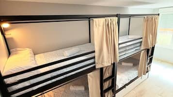 Dormitorio compartido | Wifi gratis y ropa de cama