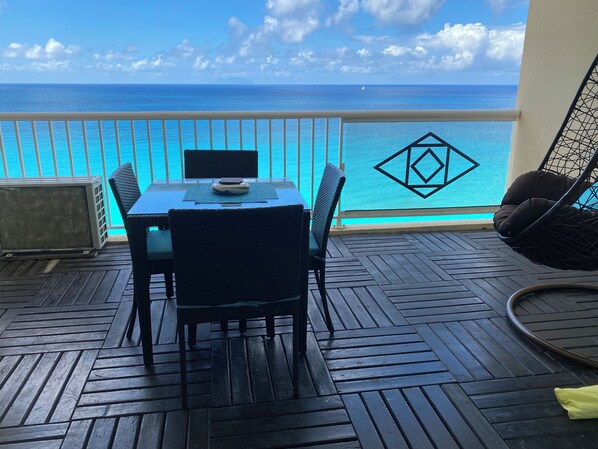 Outdoor dining - 
Beachfront Penthouse Best View Best location.  Walk to best beaches and dining. (Cupecoy)