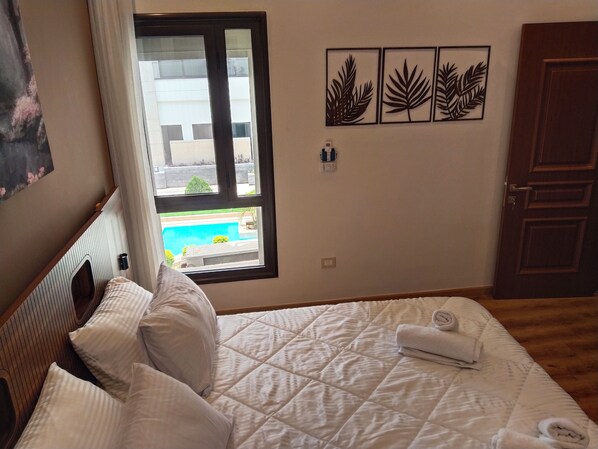 2 habitaciones, tabla de planchar con plancha, wifi y ropa de cama 