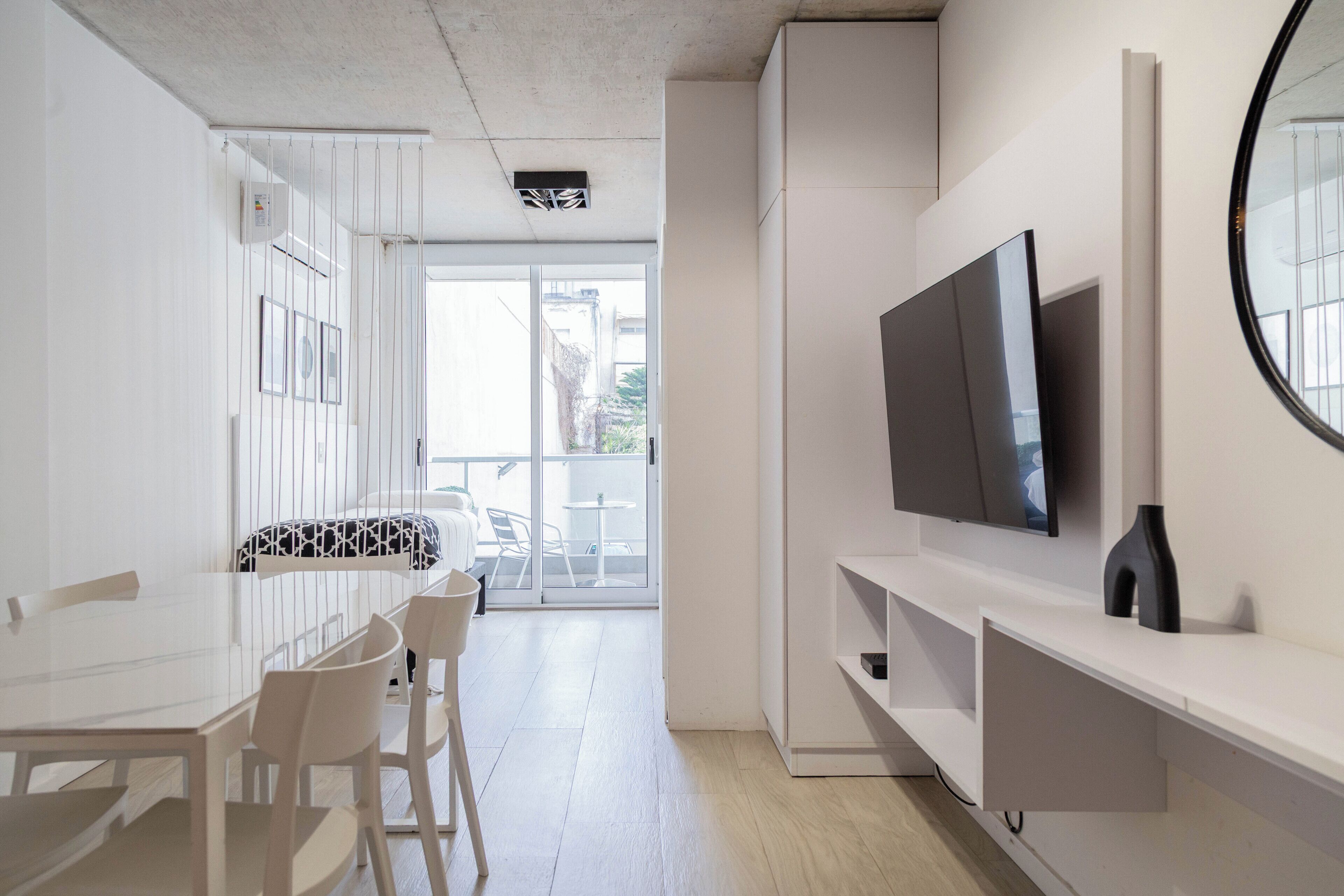 Apartment, 1 Bedroom, Balcony, City View | Living area | 40-inch Smart TV with cable channels, Netflix, streaming services