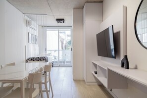 Apartment, 1 Bedroom, Balcony, City View | Living area | 40-inch Smart TV with cable channels, Netflix, streaming services