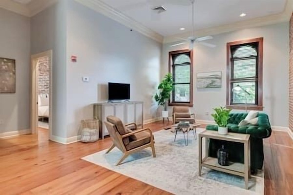 Oversized living room with windows overlooking Jefferson St