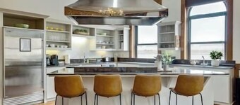 Downtown Penthouse with Commercial Kitchen & Gated Parking Sleeps 6