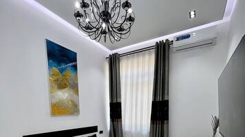 Blackout curtains, iron/ironing board, free WiFi, bed sheets