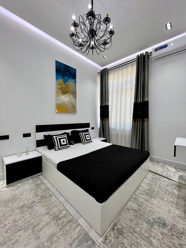 Blackout drapes, iron/ironing board, free WiFi, bed sheets