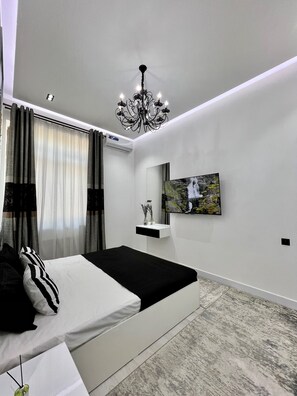 Blackout drapes, iron/ironing board, free WiFi, bed sheets