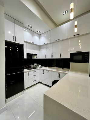 Fridge, microwave, oven, stovetop