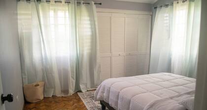Spacious 2/3/4 bedroom townhome overlooking Kingston 8 with A/C and WiFi