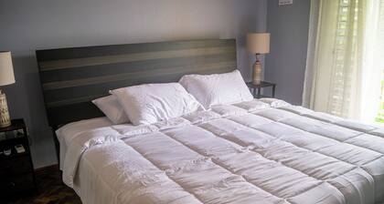 Spacious 2/3/4 bedroom townhome overlooking Kingston 8 with A/C and WiFi