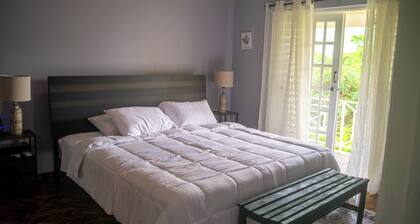 Spacious 2/3/4 bedroom townhome overlooking Kingston 8 with A/C and WiFi