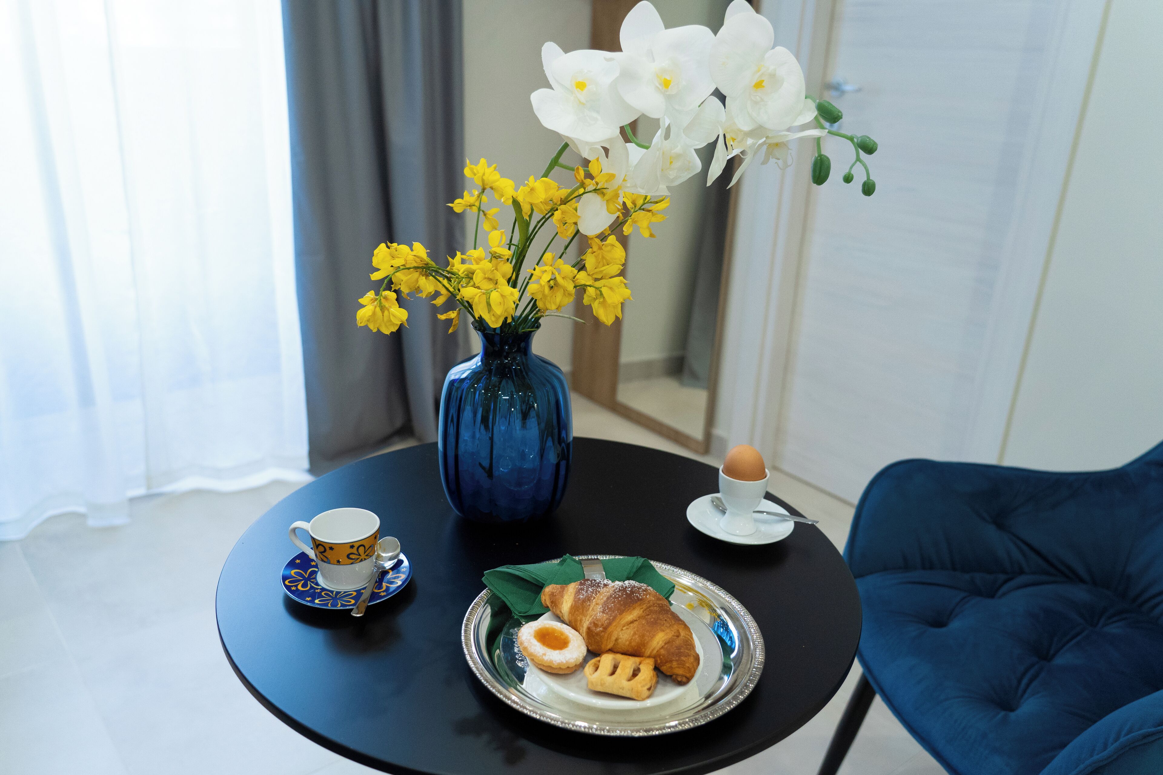 Deluxe Triple Room, Balcony, City View | In-room safe, desk, laptop workspace, blackout drapes
