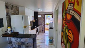 Fridge, microwave, oven, cookware/dishes/utensils