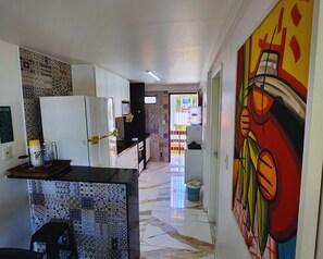 Fridge, microwave, oven, cookware/dishes/utensils