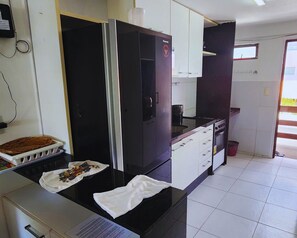 Fridge, microwave, oven, cookware/dishes/utensils