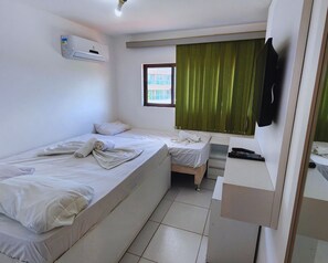 3 quartos, acesso à internet, roupa de cama