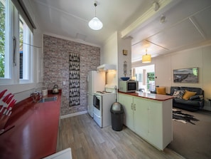 Fridge, microwave, toaster, cookware/dishes/utensils