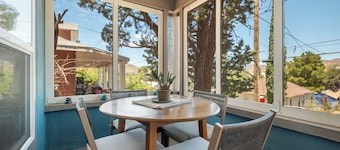 Refined Miner’s Cottage: Fenced Yard, Screened Porch.