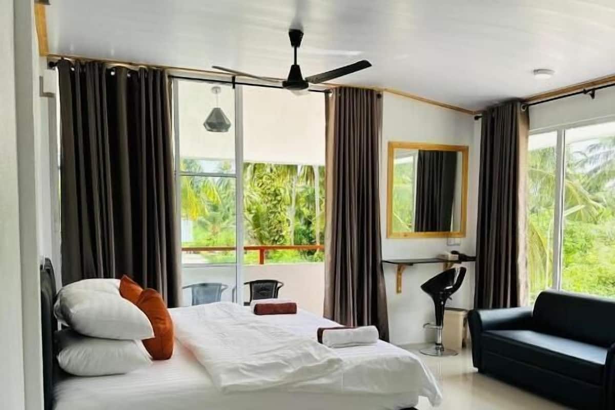 Deluxe Double Room, Balcony, City View | In-room safe, iron/ironing board, free WiFi