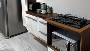 Unclassified image, 5 of 21, button - 2 bedroom house in Foz do Iguaçu, backyard and barbecue area, pet friendly (Portal da Foz Foz do Iguaçu)