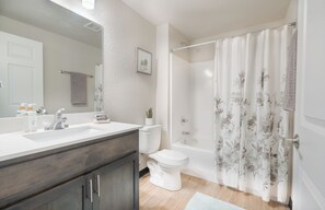 Shower, towels, soap, toilet paper