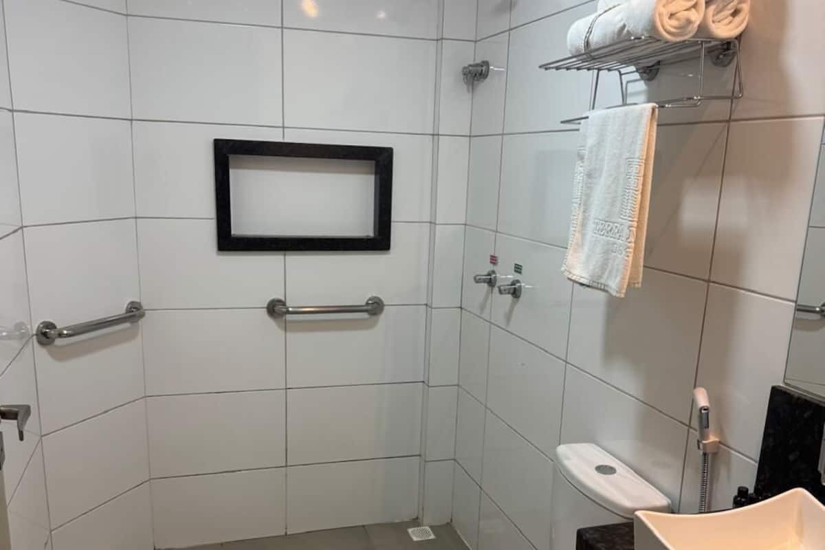 Standard Triple Room, Mobility Accessible | Bathroom | Hair dryer, towels, soap, shampoo