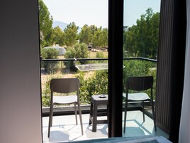 Classic Triple Room, Balcony, Garden View | Garden view