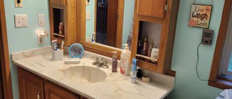 Hair dryer, towels, soap, shampoo
