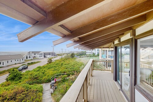 Cozy studio condo with bay views, deck, and beach steps away
