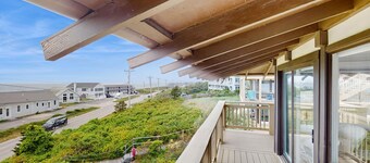 Cozy studio condo with bay views, deck, and beach steps away