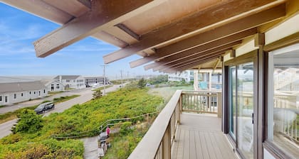 Cozy studio condo with bay views, deck, and beach steps away
