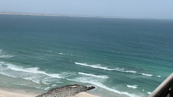 On the beach, sun loungers