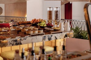 A buffet with various food items and beverages. - Doubletree By Hilton Tashkent (Tashkent)