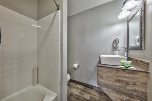 Hair dryer, towels, soap, toilet paper