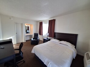 Standard Room, 1 Queen Bed, Non Smoking | Desk, laptop workspace, blackout drapes, free WiFi