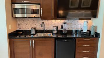 Fridge, microwave, stovetop, coffee/tea maker