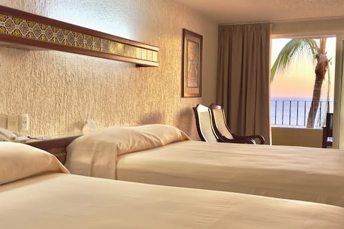 Habitación estándar vista al mar todo incluido | Literie de qualité, coffre-fort, fer et planche à repasser