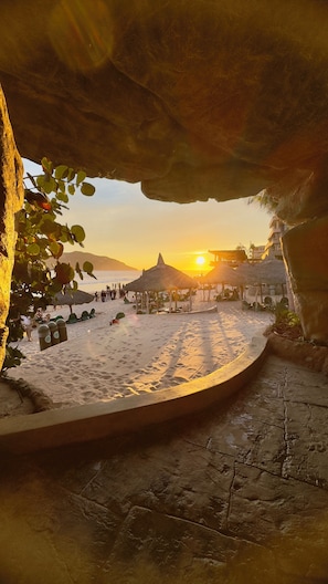 On the beach, sun-loungers, beach towels