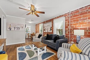 Smart TV, fireplace, table football, books