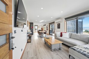 Comfort House, Bay View | Living area | 50-inch Smart TV with digital channels, Netflix, streaming services - Timbermill House - 2 Bedrooms (Midway Point)