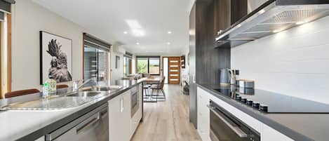 Comfort House, Bay View | Private kitchen | Coffee/tea maker, electric kettle, spices, dining tables