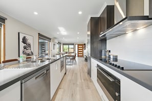 Comfort House, Bay View | Private kitchen | Coffee/tea maker, electric kettle, spices, dining tables - Timbermill House - 2 Bedrooms (Midway Point)