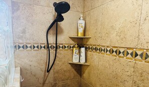 Shower, hair dryer, towels, soap