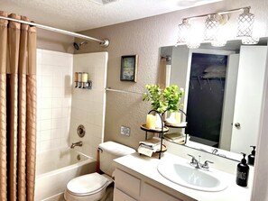 Hair dryer, towels, soap, shampoo