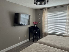 2 dormitorios, tabla de planchar con plancha, wifi gratis y ropa de cama
