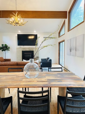 Smart TV, fireplace, table football, books