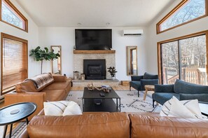 Smart TV, fireplace, table football, books